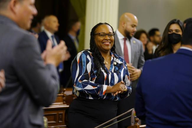 FILE - Assemblywoman Lori Wilson, D-Suisun City, receives applause as she is introduced during an Assembly session in Sacramento, Calif., on April 7, 2022. Lawmakers on Wednesday, Sept. 6, 2023. debated legislation that would require courts to co<em></em>nsider whether a parent affirms their child's gender identity in custody introduced by Assemblywoman Wilson and other cases. It was one of dozens of bills that got a vote in the Legislature as lawmakers speed toward a Sept. 14 deadline. (AP Photo/Rich Pedroncelli, File)